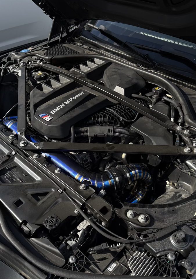 M Power engine bay with upgraded charge pipes